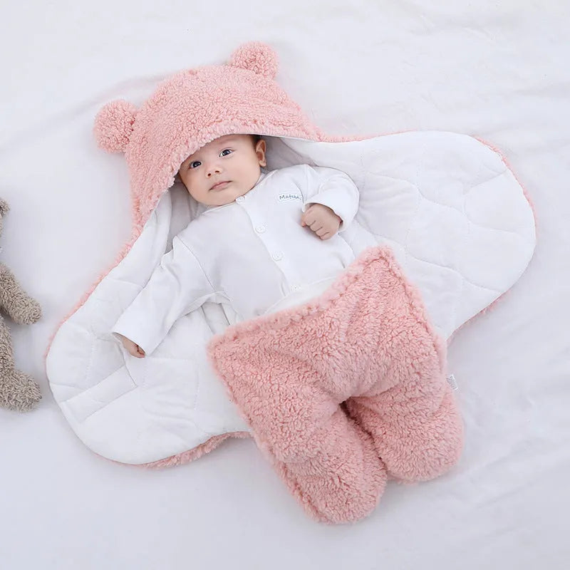 Baby quilted sleeping bag wrapper in cotton blend fabric showing size and colour options