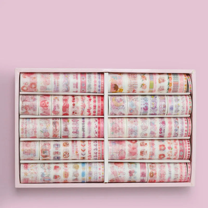 Box of 100 antique character decorative paper tape rolls in assorted colours and widths for accounting and crafts.