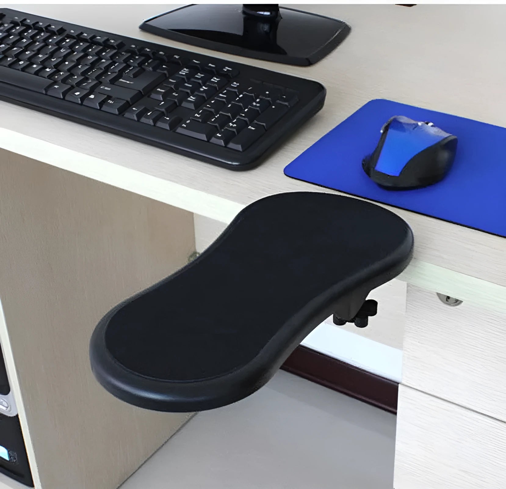 Black plastic computer wrist pad with rotatable hand bracket showing 180-degree adjustment