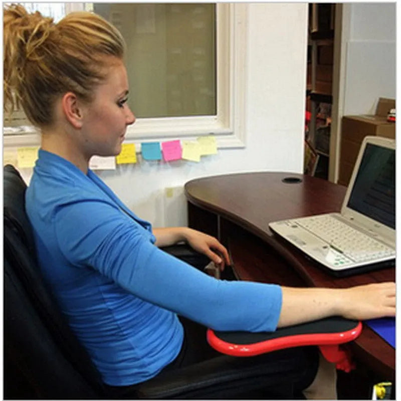 Black plastic computer wrist pad with rotatable hand bracket showing 180-degree adjustment