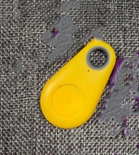 Compact Bluetooth-enabled anti-lost tracking device for keys, wallets, and other everyday essentials
