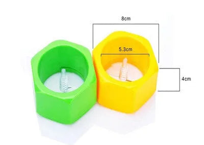 Yellow and green kitchen vegetable cutter creating cucumber spirals with food-grade ABS plastic construction