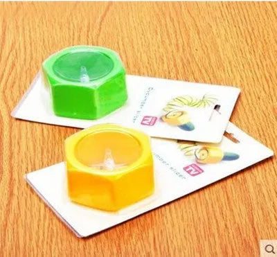 Yellow and green kitchen vegetable cutter creating cucumber spirals with food-grade ABS plastic construction