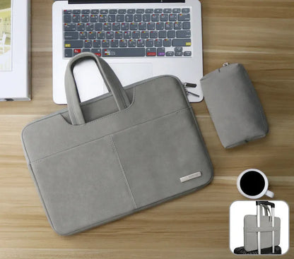 Blue waterproof laptop bag with zipper opening showing internal computer pocket and organisational compartments