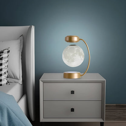 Magnetic levitation moon lamp floating above base with three colour changing effects
