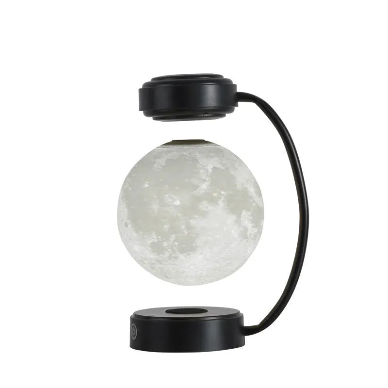 Magnetic levitation moon lamp floating above base with three colour changing effects