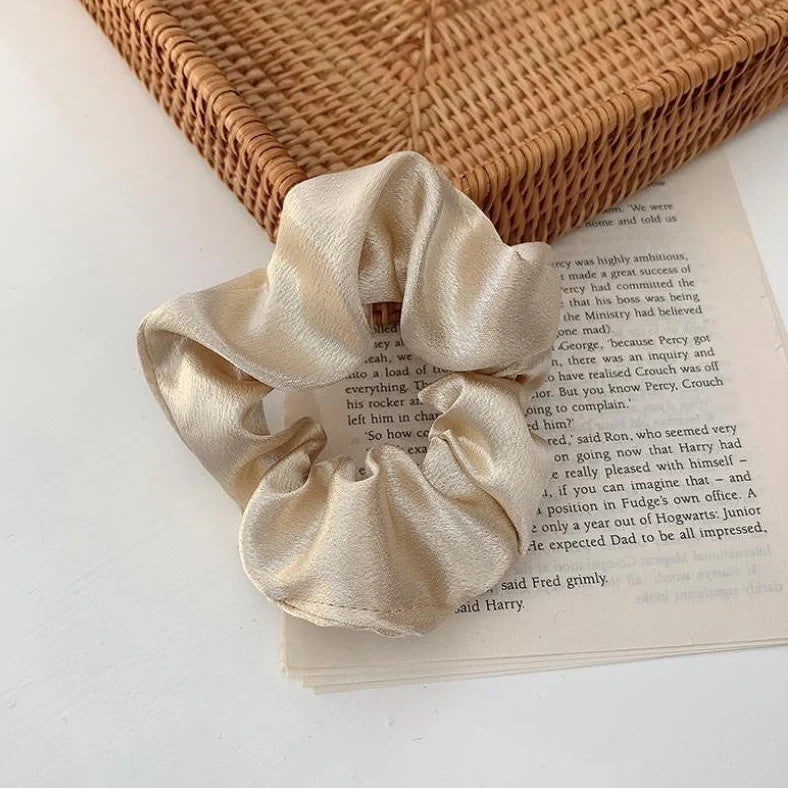 Silk large intestine ring hair tie in multiple colours showing woven construction and 3cm diameter