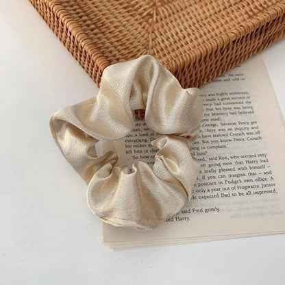 Silk large intestine ring hair tie in multiple colours showing woven construction and 3cm diameter