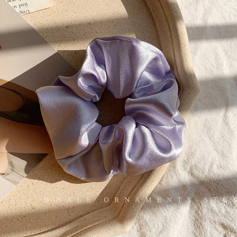 Silk large intestine ring hair tie in multiple colours showing woven construction and 3cm diameter