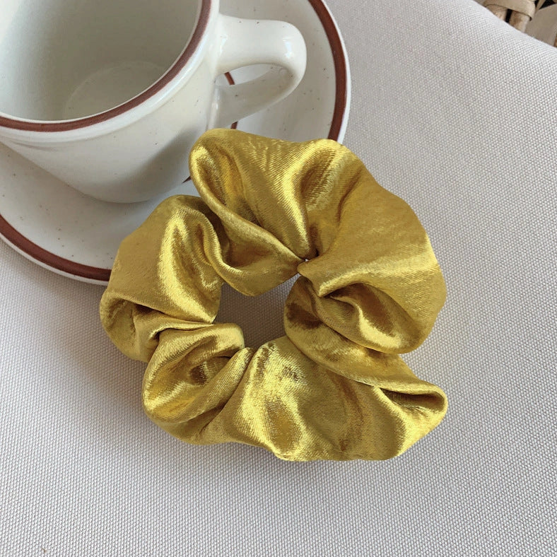 Silk large intestine ring hair tie in multiple colours showing woven construction and 3cm diameter
