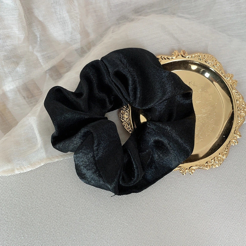 Silk large intestine ring hair tie in multiple colours showing woven construction and 3cm diameter
