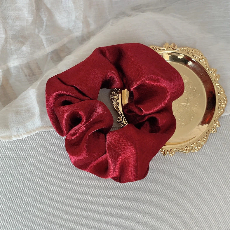 Silk large intestine ring hair tie in multiple colours showing woven construction and 3cm diameter