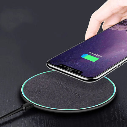 Black aluminium alloy wireless car charger measuring 100mm x 60mm with 10W fast charging