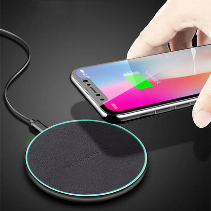 Black aluminium alloy wireless car charger measuring 100mm x 60mm with 10W fast charging