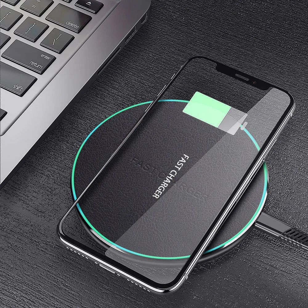Black aluminium alloy wireless car charger measuring 100mm x 60mm with 10W fast charging