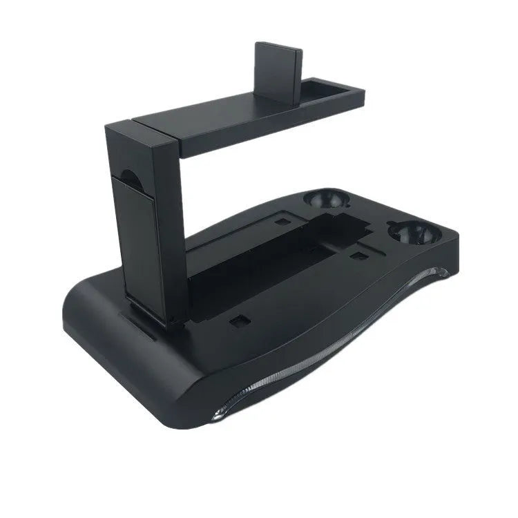 Black ABS charging base for PlayStation 4 VR controllers on a gaming desk