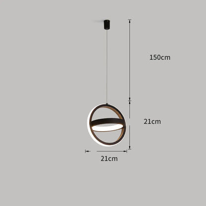Minimalist black iron single head chandelier with remote control on a bedside table.