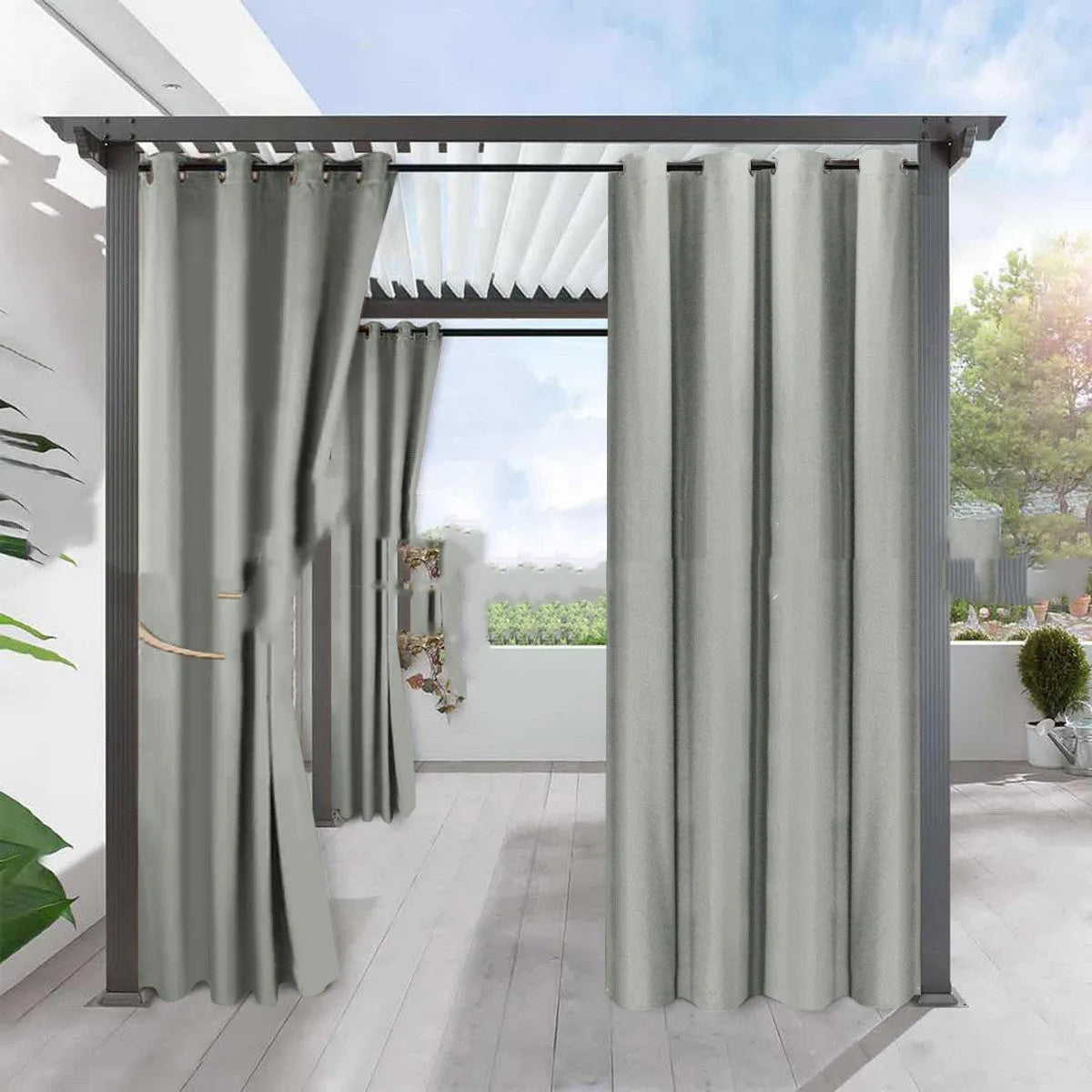 Solid colour blackout curtain panel in neutral colour with pre-punched holes along top edge