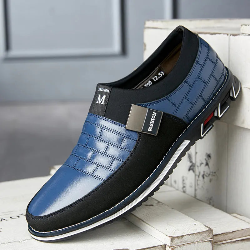 Men's low-cut blue leather casual shoes on a white background, showing the leisure design.