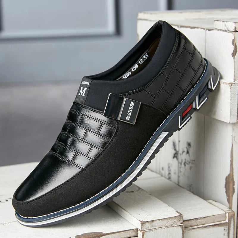 Men's low-cut blue leather casual shoes on a white background, showing the leisure design.