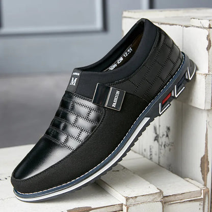 Men's low-cut blue leather casual shoes on a white background, showing the leisure design.