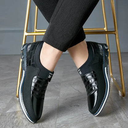 Men's low-cut blue leather casual shoes on a white background, showing the leisure design.