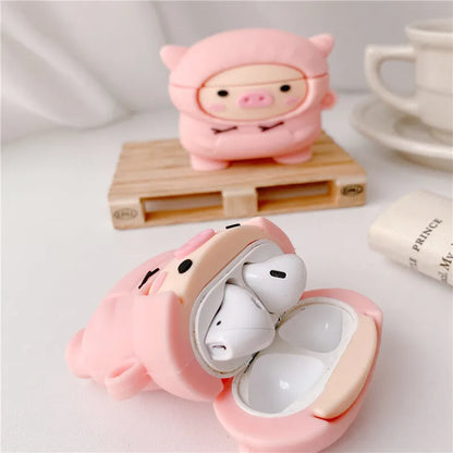 Pink silicone cartoon pig flip-case for AirPods with a metal carry hook attached.