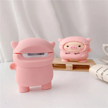 Pink silicone cartoon pig flip-case for AirPods with a metal carry hook attached.