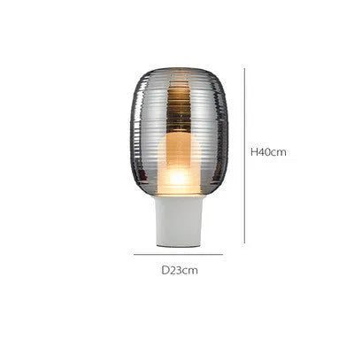Simple modern glass table lamp with Nordic design in cognac colour featuring LED light source