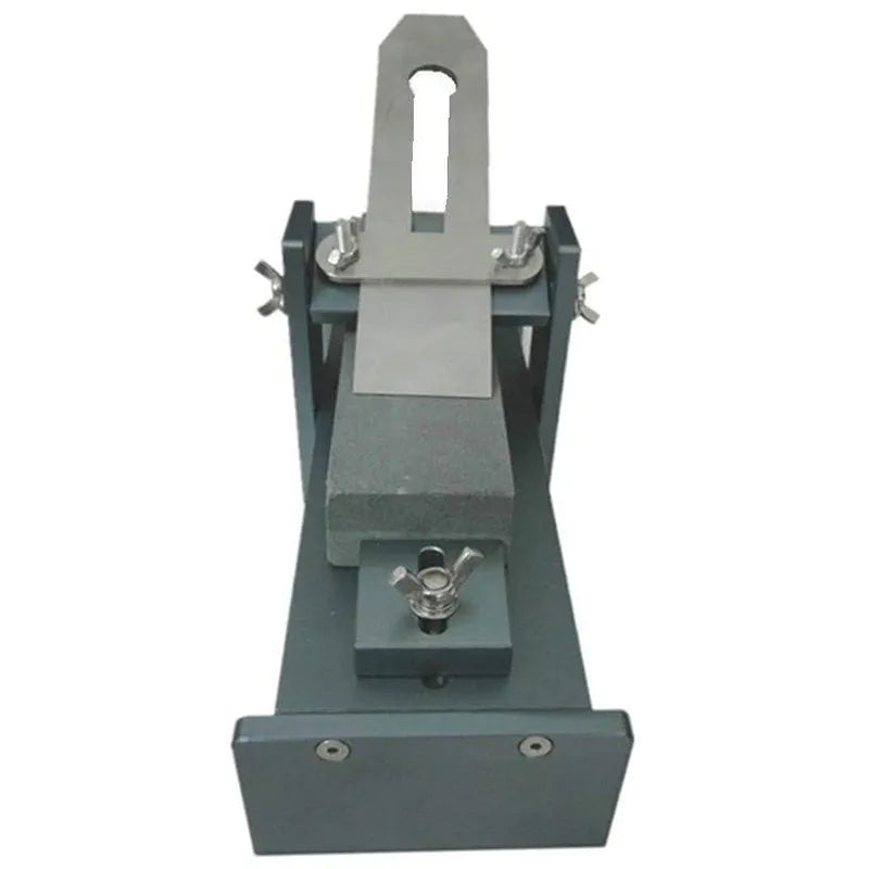 Fixed angle woodworking sharpening tool for chisels, planers and carving knives.