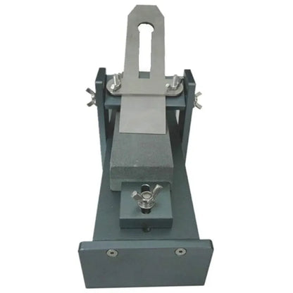 Fixed angle woodworking sharpening tool for chisels, planers and carving knives.