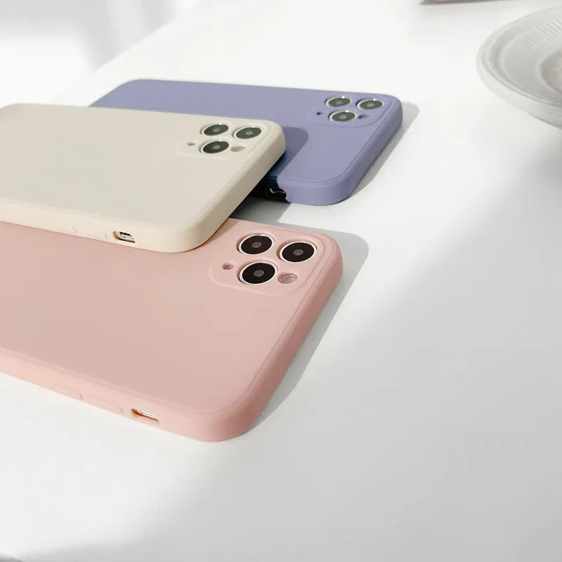 Solid colour silicone iPhone case in straight edge powder, slate blue and antique white options