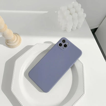 Solid colour silicone iPhone case in straight edge powder, slate blue and antique white options