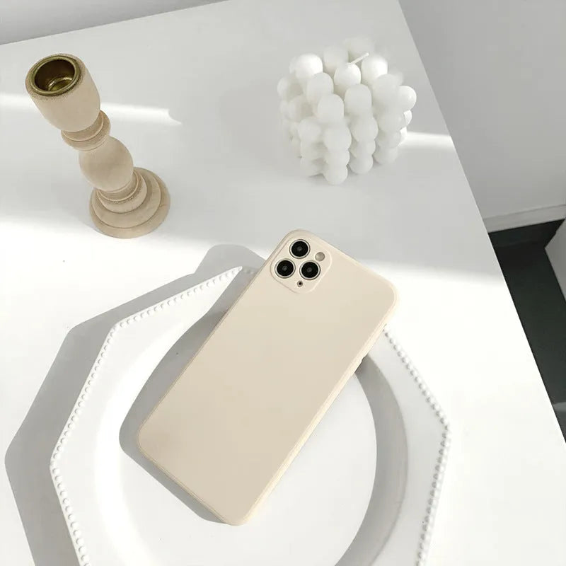 Solid colour silicone iPhone case in straight edge powder, slate blue and antique white options