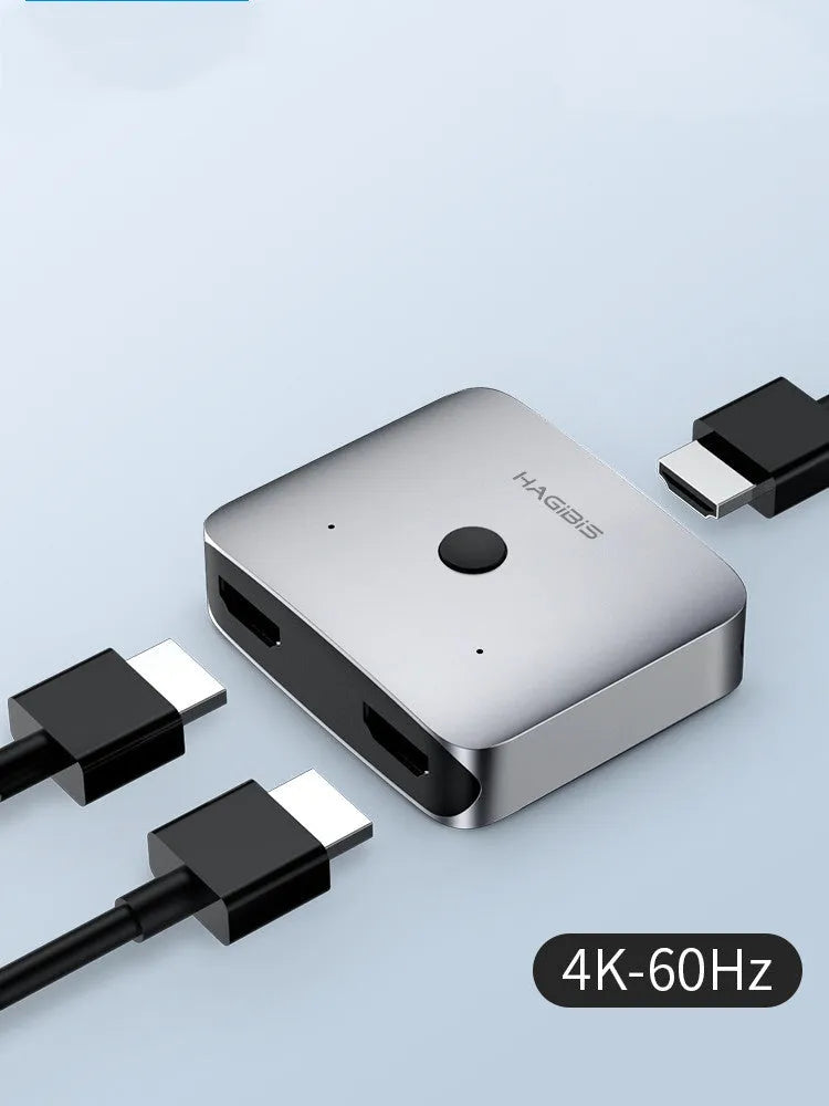 Grey Haibeisi HDMI switcher box with 2 input and 1 output ports for 4K video.