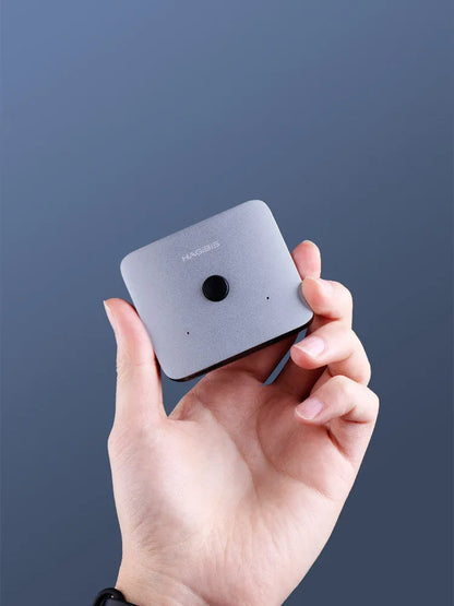 Grey Haibeisi HDMI switcher box with 2 input and 1 output ports for 4K video.
