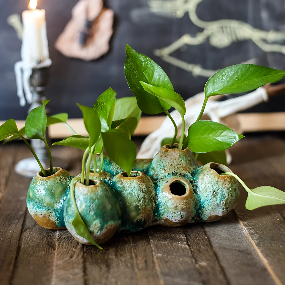 Medium-sized ceramic Barnacle Vase with porous flower design in new Chinese style, on a table.