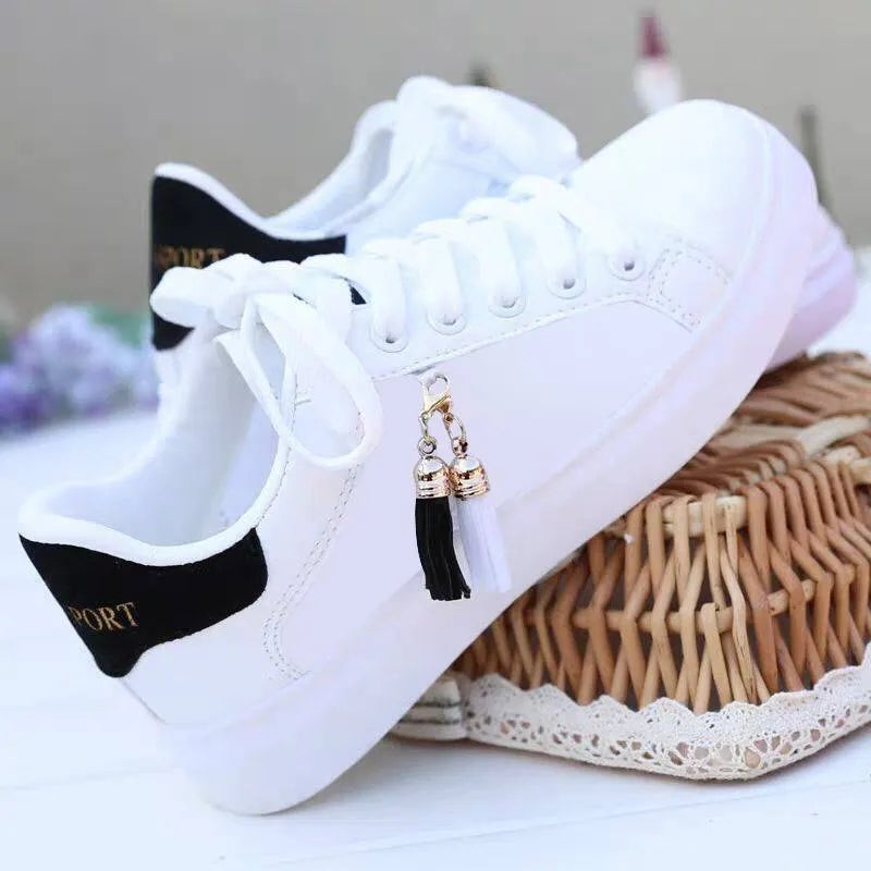 Women's white mesh fashion flat shoes with rubber sole in pink and black colour options.
