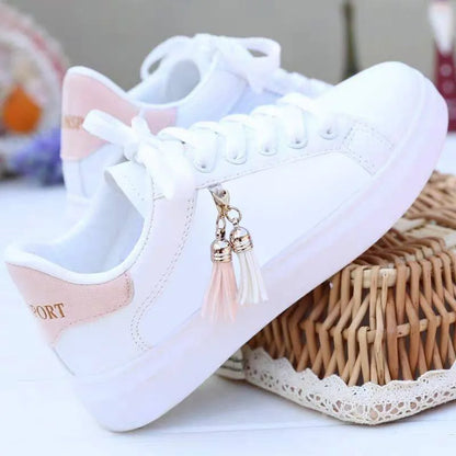 Women's white mesh fashion flat shoes with rubber sole in pink and black colour options.