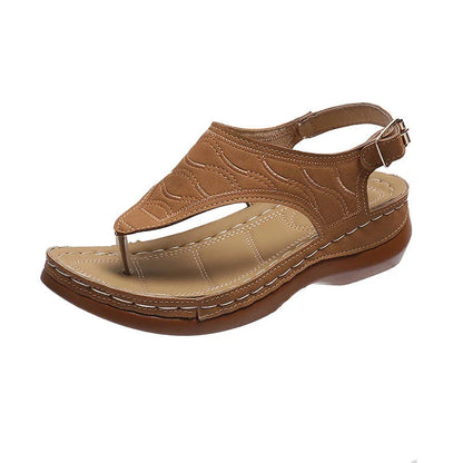 Comfortable women's wedge sandals in various colors with adjustable straps and a lightweight sole