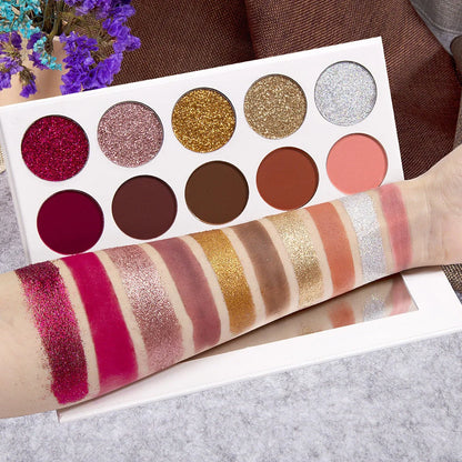 Eyeshadow palette showing 10 different colour shades in standard compact