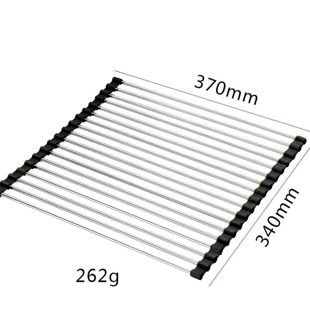 Stainless steel sink drain rack with rolling curtain design folded to show compact 5cm storage thickness