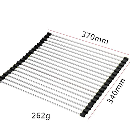 Stainless steel sink drain rack with rolling curtain design folded to show compact 5cm storage thickness