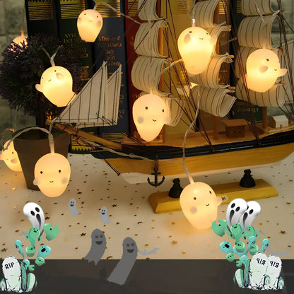 Pumpkin and ghost themed LED lantern with warm white lights in Nordic design style for Halloween decoration