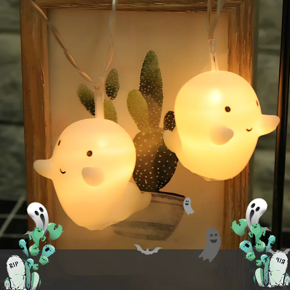 Pumpkin and ghost themed LED lantern with warm white lights in Nordic design style for Halloween decoration