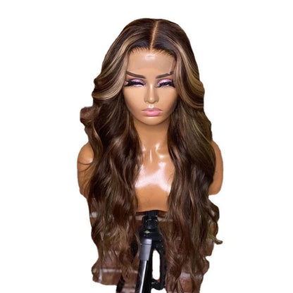 Long curly synthetic wig with lace front and gradient colours, styled with angled bangs