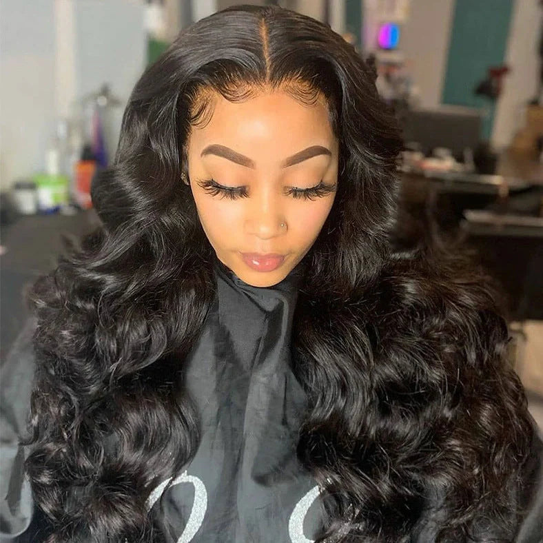 Long curly synthetic wig with lace front and gradient colours, styled with angled bangs