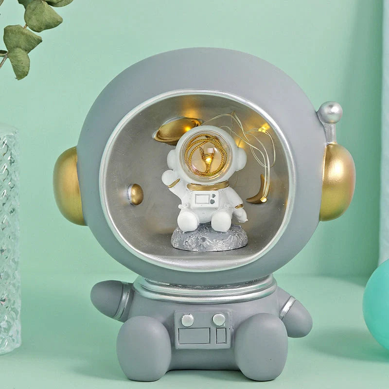 Astronaut-themed LED night light piggy bank with hand-painted resin craft