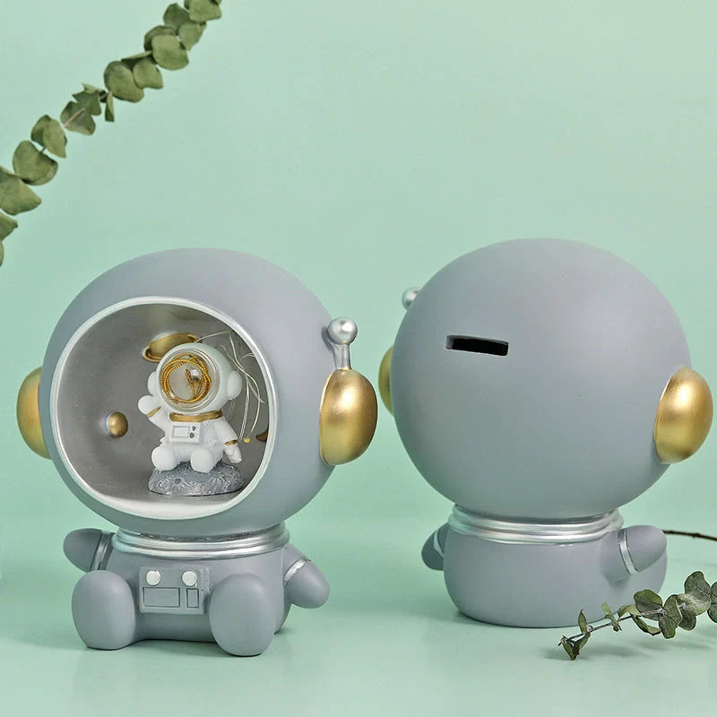 Astronaut-themed LED night light piggy bank with hand-painted resin craft