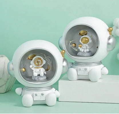 Astronaut-themed LED night light piggy bank with hand-painted resin craft